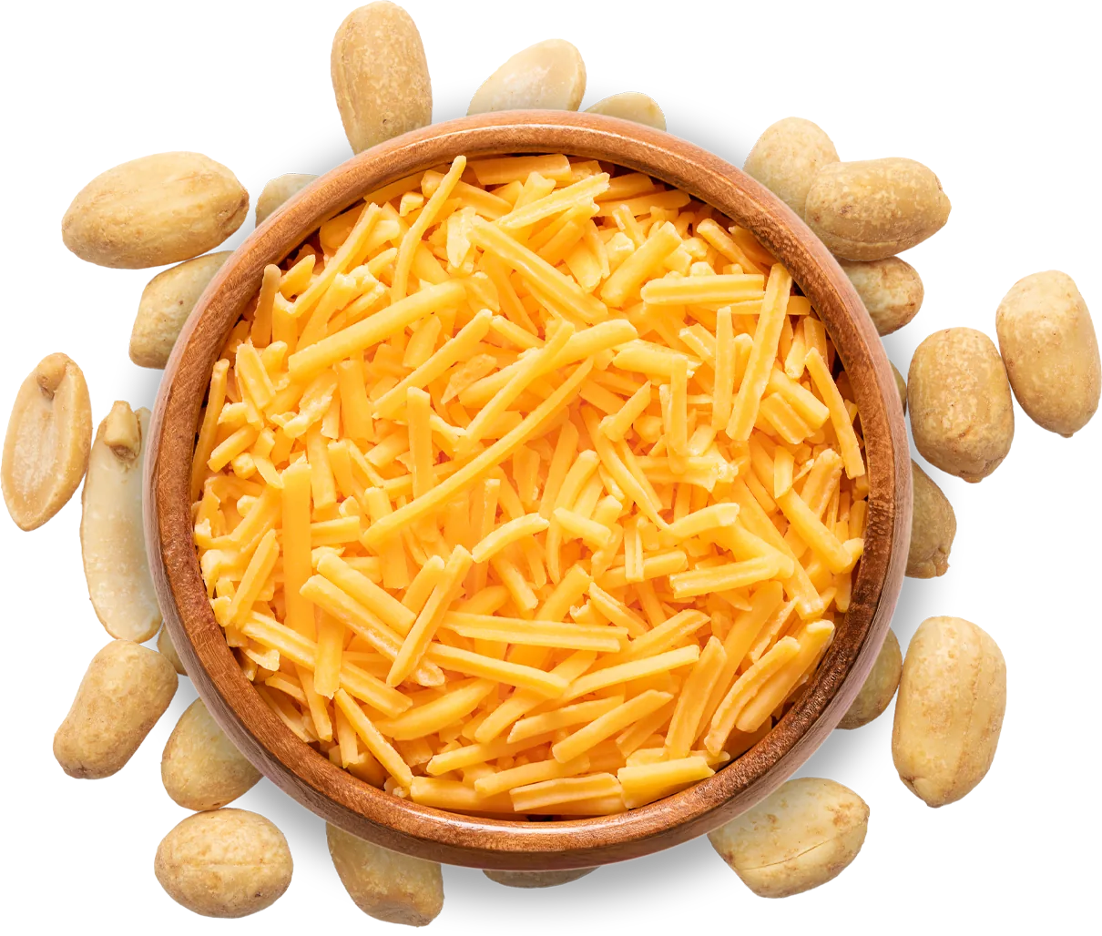 Geriebener Cheddar in einer Schale mit Nüssen außenherum.